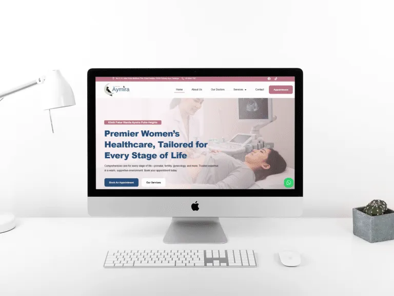 Women's healthcare website displayed on a desktop monitor, showcasing tailored services for every life stage.