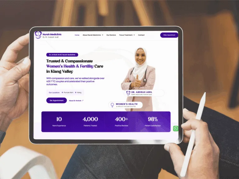 Tablet displaying a women's health and family care website, featuring a professional in a white coat, highlighting services in Klang Valley.